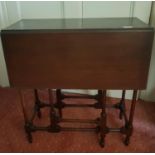 An Edwardian Mahogany Sutherland Table. 70 x 60 H cm.