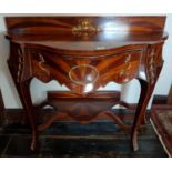 A fantastic Mahogany, Rosewood and Satinwood Continental Side Table with ormolu mounts.