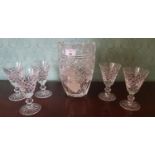 A large Waterford Crystal Vase along with five Waterford Crystal Glasses.