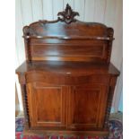 A Victorian Walnut Chiffonier with barley twist supports.