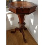 A 19th Century Parquetry and Walnut Sewing Box on a tripod base.