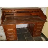 An early 20th Century Oak Roll Top Desk.