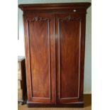 A Victorian Mahogany two door Wardrobe. 133 W x 57 D x 210cm.