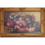 A 19th Century Oil on Canvas still life of flowers in a highly gilt frame.