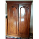 A Victorian Mahogany Two Door Wardrobe.