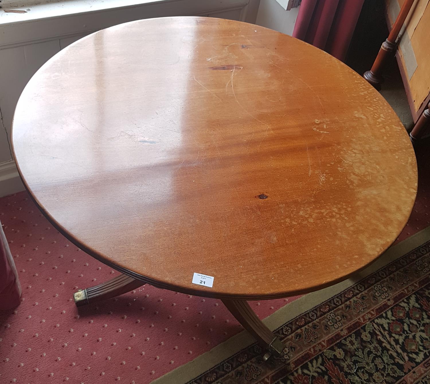 A good Mahogany Circular Supper Table with reeded base and brass toe casters. 90cm diameter. - Image 2 of 3