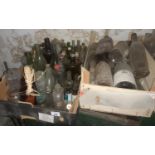 A large quantity of Vintage Bottles in two crates.