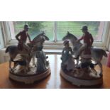 A pair of Porcelain Hunting Figures.
