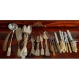 A good quantity of plated Cutlery to include knives, spoons, forks, basting spoons and soup ladles