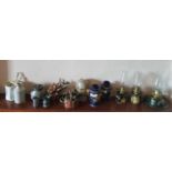 A shelf of decoupage Oil Lamps and vases etc.