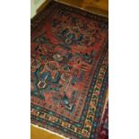 A Pink and Blue Ground Persian Hamadan Rug. 146 x 205cm.