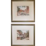 A set of four signed Coloured Prints of village scenes. 19 x 15.5cm.