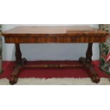 A Superb Regency Rosewood Library Table with turned carved shaft, platform and stretchered base