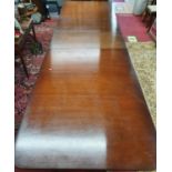 A really good Regency style three pillar Boardroom Table on tripod supports with two leaves. Fully