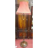 A good early 20th Century Mahogany Standard Lamp with fluted shaft.