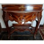 A fantastic Mahogany, Rosewood and Satinwood Continental Side Table with ormolu mounts.