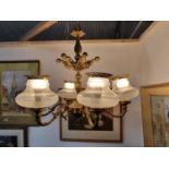 A20th Century Brass and Glass six branch Chandelier with Cherubs.