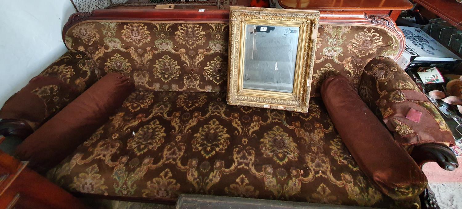 A really good 19th Century Mahogany show frame Couch with highly carved cabriole front supports