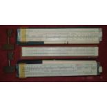 Three vintage Draughtsman's Rulers along with two vintage railway keys.