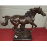 A good Bronze Sculpture of a Horse. Makers name indistinct. 31 x 40cm.