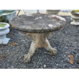 A reconstituted Stone or heavy Stone circular Table.