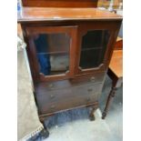 An Edwardian Mahogany Display Cabinet with three graduated drawers W 69 x H123 x D43 cms.