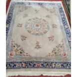 A really good oriental Carpet with cream ground. 330 x 248 cms.