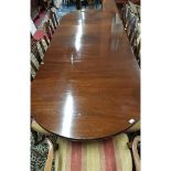 An early 20th Century Mahogany three pillar D end Dining Table with a fluted frieze. Approx L282 x