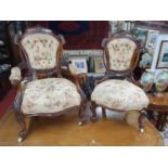 A lovely pair of 'His' and 'Hers' 19th Century Walnut Armchairs.