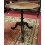 A Circular Georgian Table. 58 cms diam.