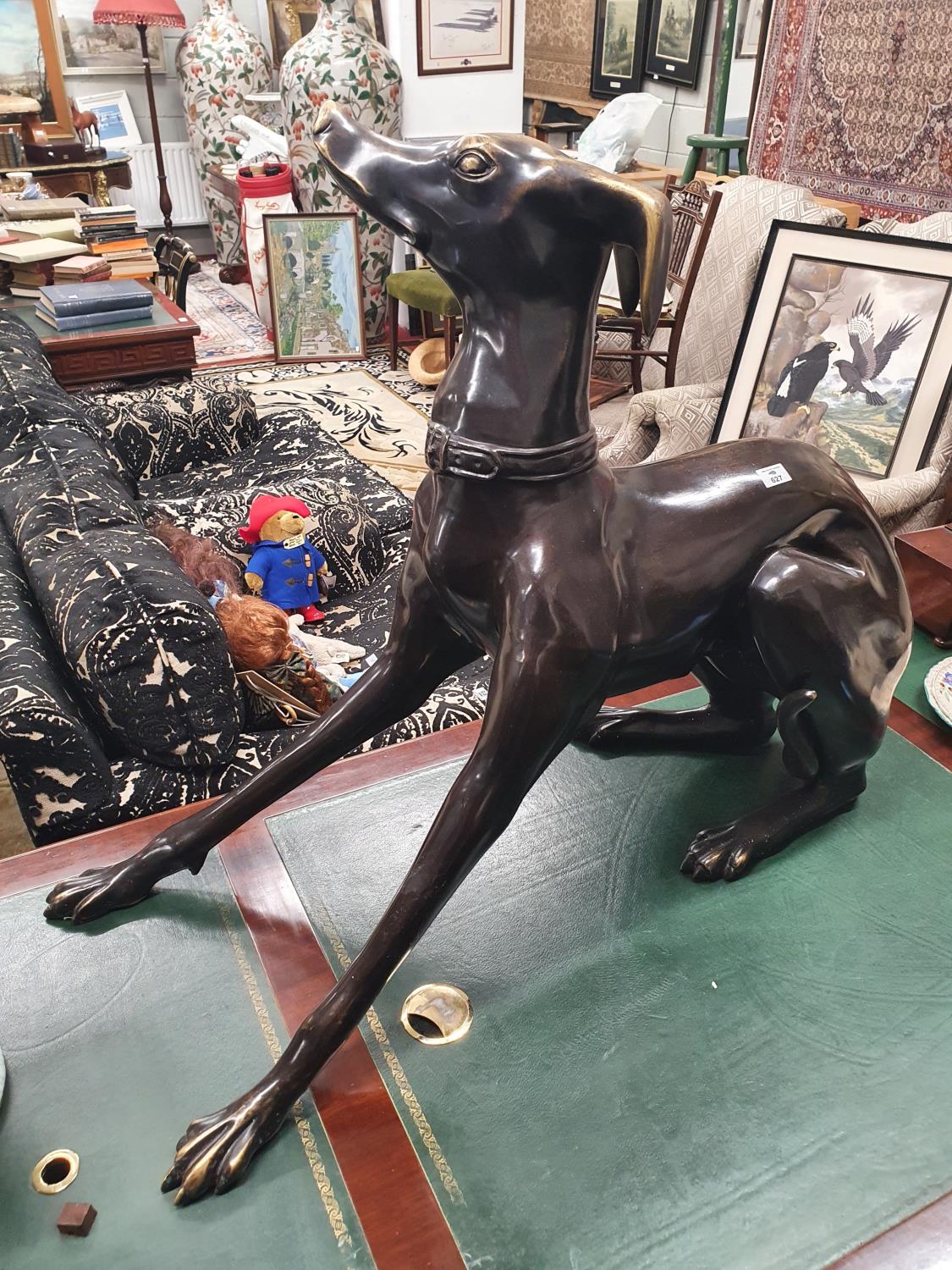 The property of The 5 star Hotel in London. A large Bronze Casting of a Greyhound. 95 cms L x 40 w x