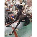 The property of The 5 star Hotel in London. A large Bronze Casting of a Greyhound. 95 cms L x 40 w x