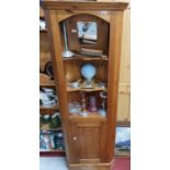 A Pine Corner Cabinet. 183 cms H.