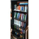 A very large quantity of Books in an open bookcase.