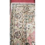 A very large Pink Ground Carpet with allover decoration.435 X 335 cms.