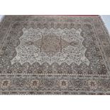 A lovely large Cream Ground Carpet with allover decoration and multi borders.364 X 280 cms.