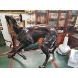 The property of The 5 star Hotel in London. A very large life size Bronze figure of a Greyhound. 116