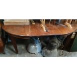 A Victorian Mahogany Dining Table.