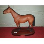 A large Royal Doulton figure of Red Rum.