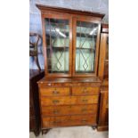 A lovely Regency Mahogany Bookcase/Display Cabinet with reeded beaded doors and chest base with