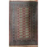 A good red/ burgundy Rug. 156 c 100 cms.