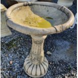 A reconstituted Stone Bird Bath.