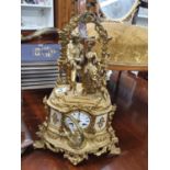 A good 19th Century Gilded Mantel Clock with onyx panels and enamel white dial from Lerox A Paris.