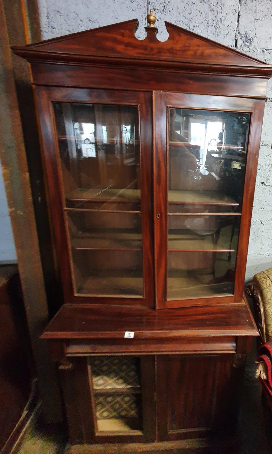 A really good Georgian Mahogany two door Bookcase of neat proportions.(panel missing in door).