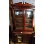 A really good Georgian Mahogany two door Bookcase of neat proportions.(panel missing in door).