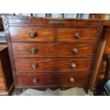 A large Georgian Mahogany Chest of Drawers with original timber knobs and mother of pearl insert.