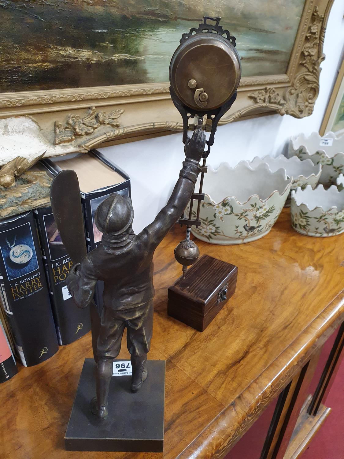 A good Bronzed Aviation Mystery Clock along with a reproduction Victorian Marine Telescope (boxed).