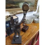 A good Bronzed Aviation Mystery Clock along with a reproduction Victorian Marine Telescope (boxed).