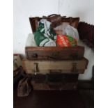 A quantity of 19th Century and later leather Suitcases along with a metal food bin.