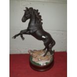 An early large Beswick Figure of Concara, the Black Horse monelled by J D Jongue for the Beswick